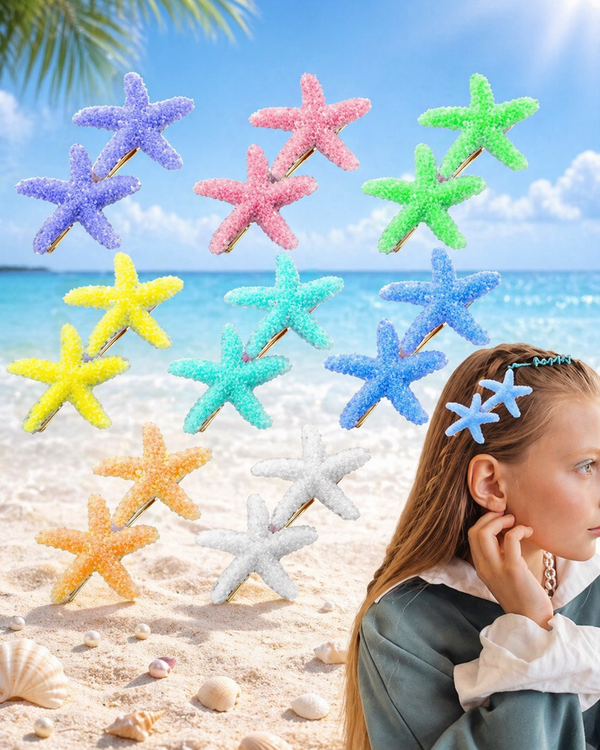 Colorful starfish hair clips on a beach with a clear blue sky.