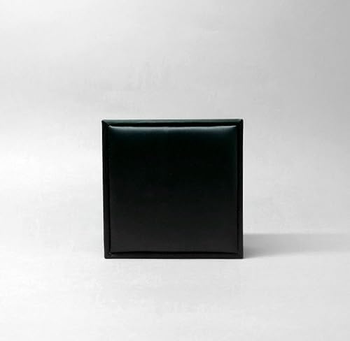 Black leather velvet jewelry box by 7AGAT with compartments for bracelets, necklaces, rings, and watches.