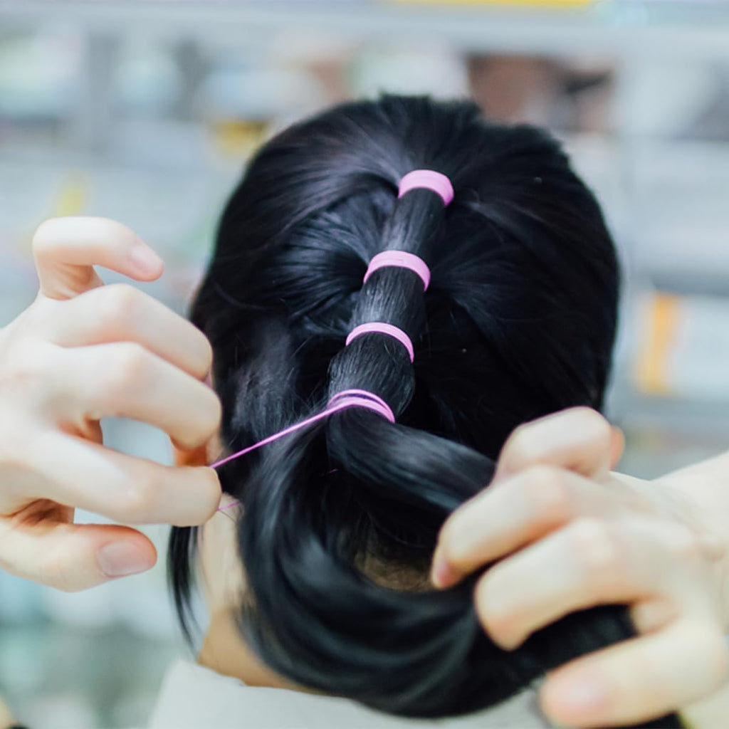 Set of 7AGAT elastic hair bands and ponytail holders for women and kids, featuring rubber hair ties in various sizes and colors.