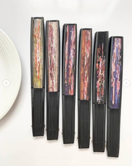High-quality 7AGAT hand fan with durable plastic and leather, featuring a double-sided floral pattern for weddings and celebrations.