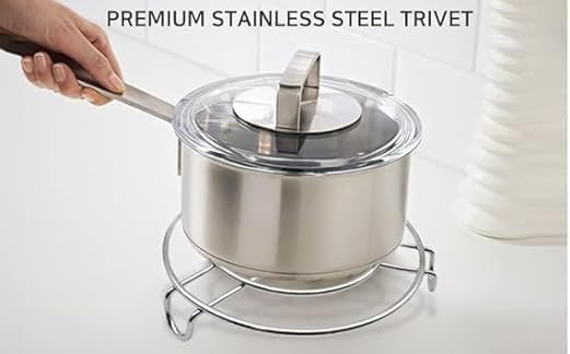 Round stainless steel hot pot mat by 7AGAT, heat-resistant and slip-proof, protecting tables from hot cookware.