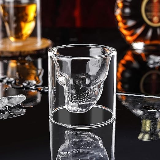 Double wall skull-shaped glass cup by 7AGAT, heat-resistant borosilicate glass for hot and cold drinks like espresso and tea.