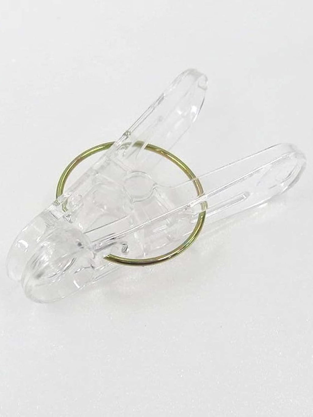 Set of 24 clear plastic clothespins with metal hanging rings, ideal for laundry, photos, and craft projects by 7AGAT.