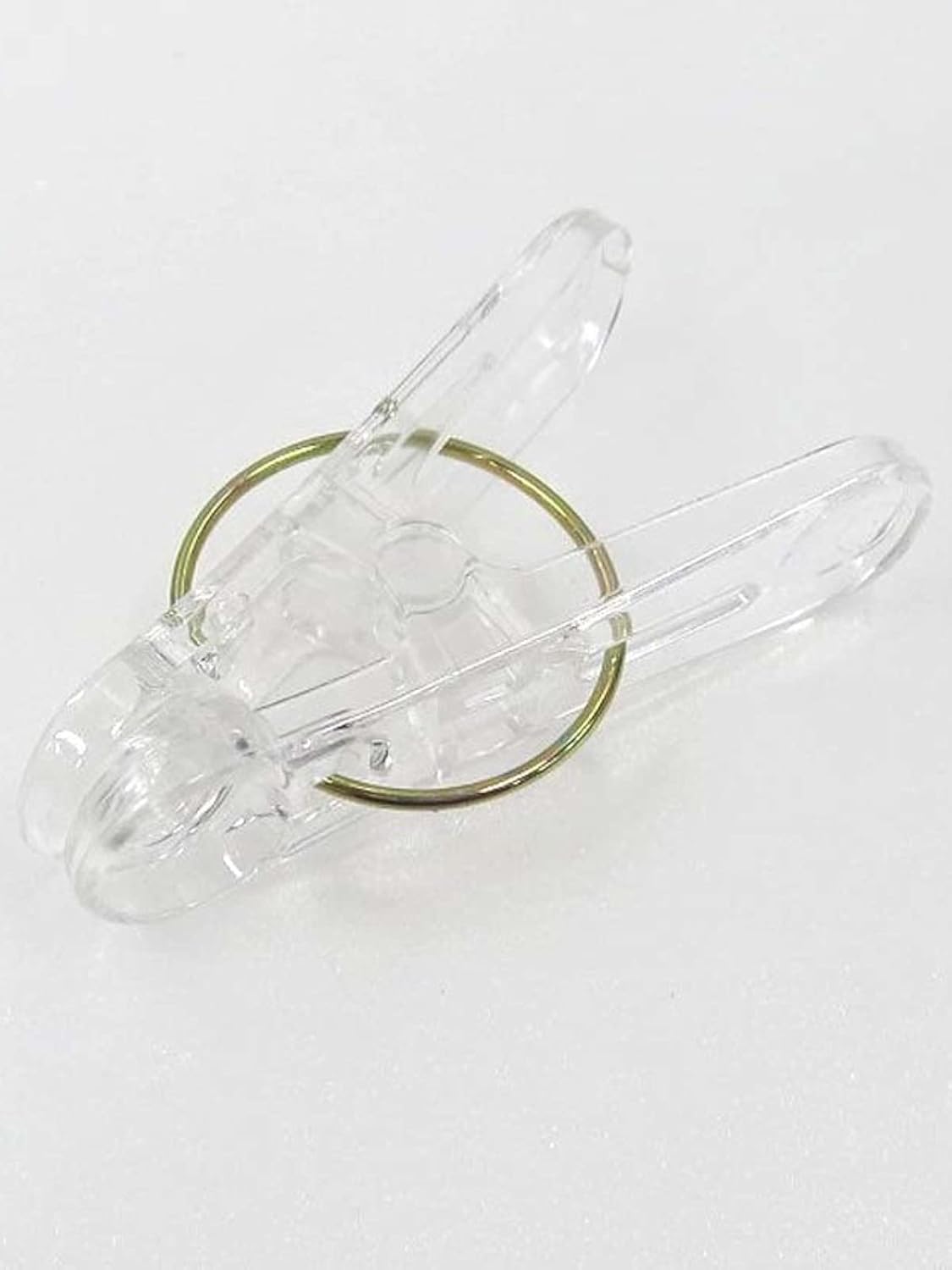Set of 24 clear plastic clothespins with metal hanging rings, ideal for laundry, photos, and craft projects by 7AGAT.