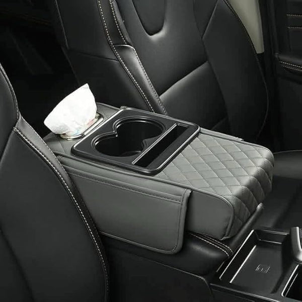 Grey leather car armrest cover organizer with padded rhombus design, two cup holders and tissue opening, 35x20x8 cm.