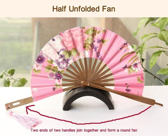 Vibrant red traditional round folding hand fan with floral pattern on wooden stand, ideal for weddings and dance events.