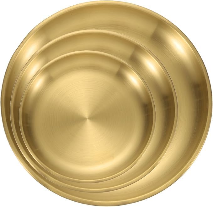 Set of three gold stainless steel round serving plates in different sizes, ideal for kitchen, restaurant, salad, dessert, or outdoor use.