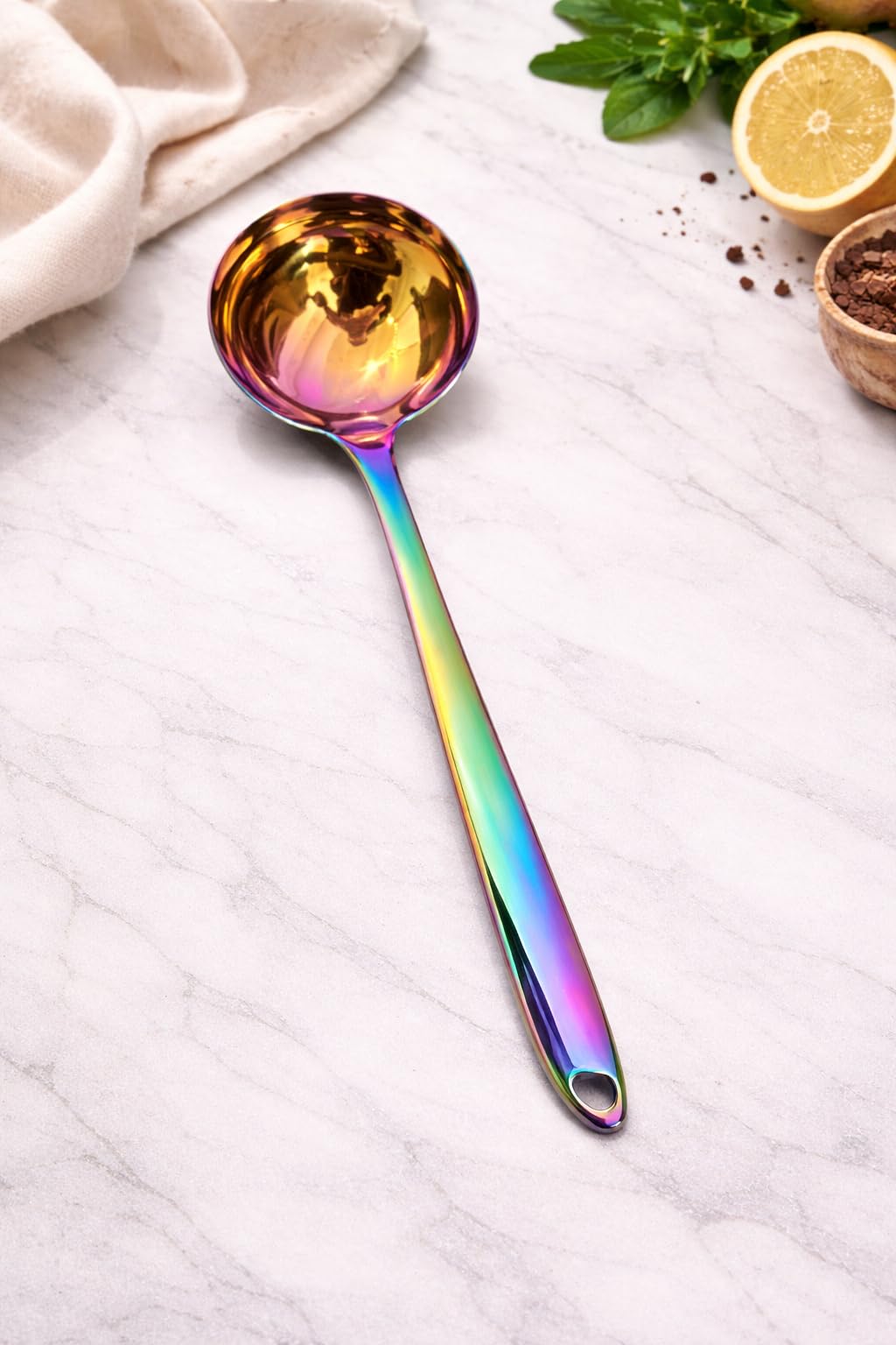 7AGAT stainless steel kitchen utensil with ergonomic handle, heat and rust-resistant, dishwasher safe, in silver, gold, and rainbow finishes.