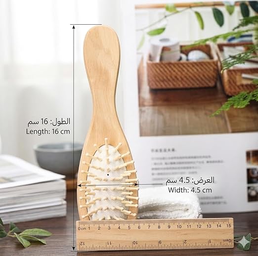 Natural wooden hair brush by 7AGAT with scalp massage design, lightweight and suitable for all hair types, shown from side view.