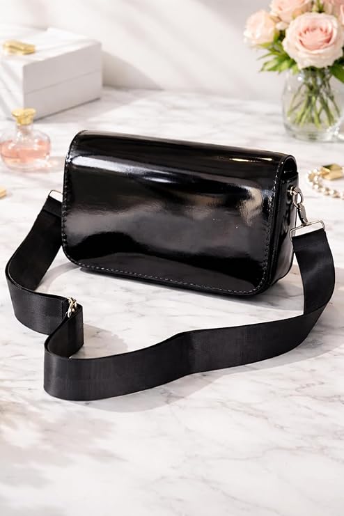 7AGAT women's handbag with stylish shoulder and crossbody strap, casual and evening purse in black leather with gold accents.