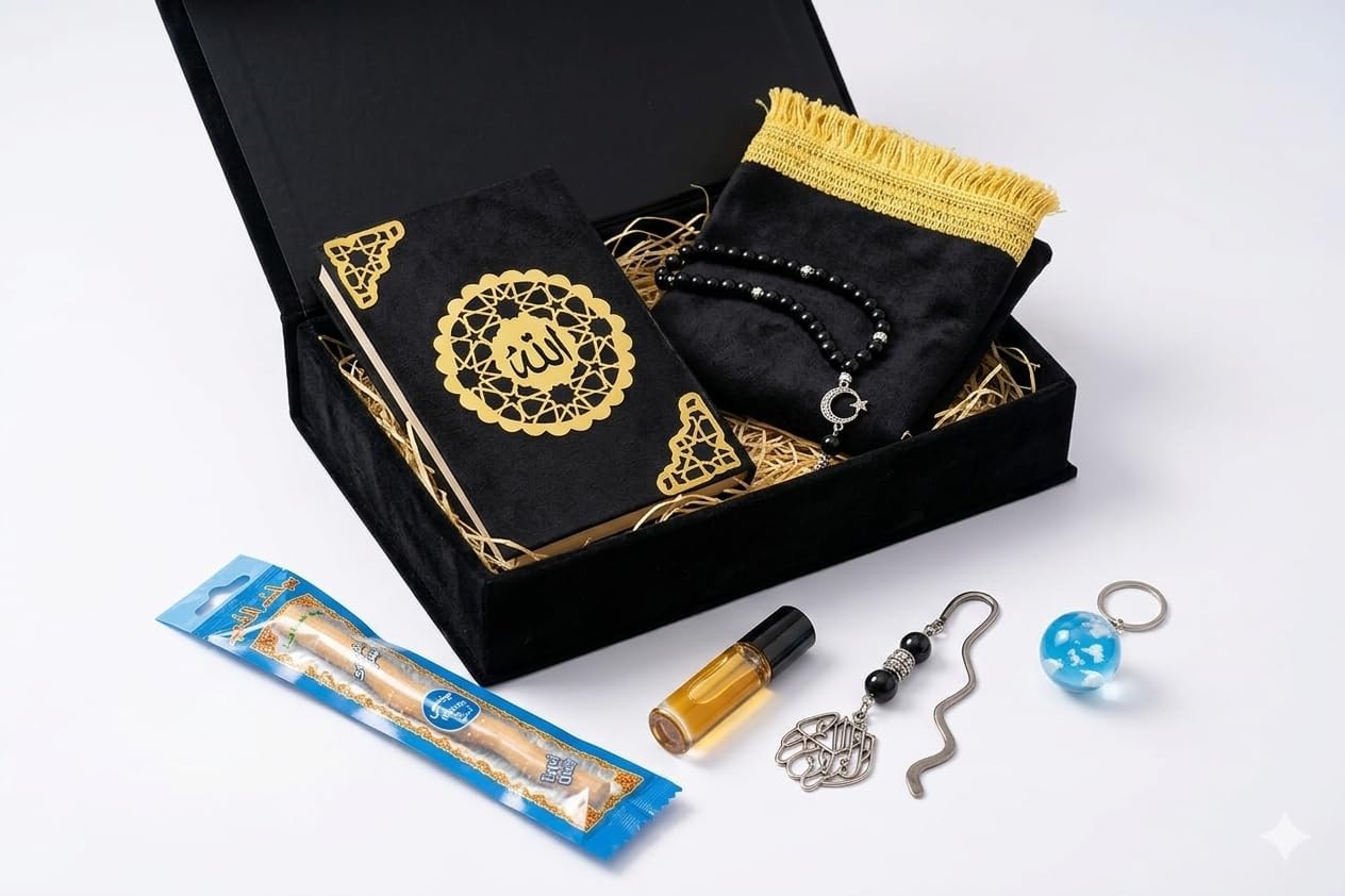 Islamic gift box by 7AGAT with prayer rug, Quran, prayer beads, musk, keychain, and miswak stick, ideal for Ramadan gifts.