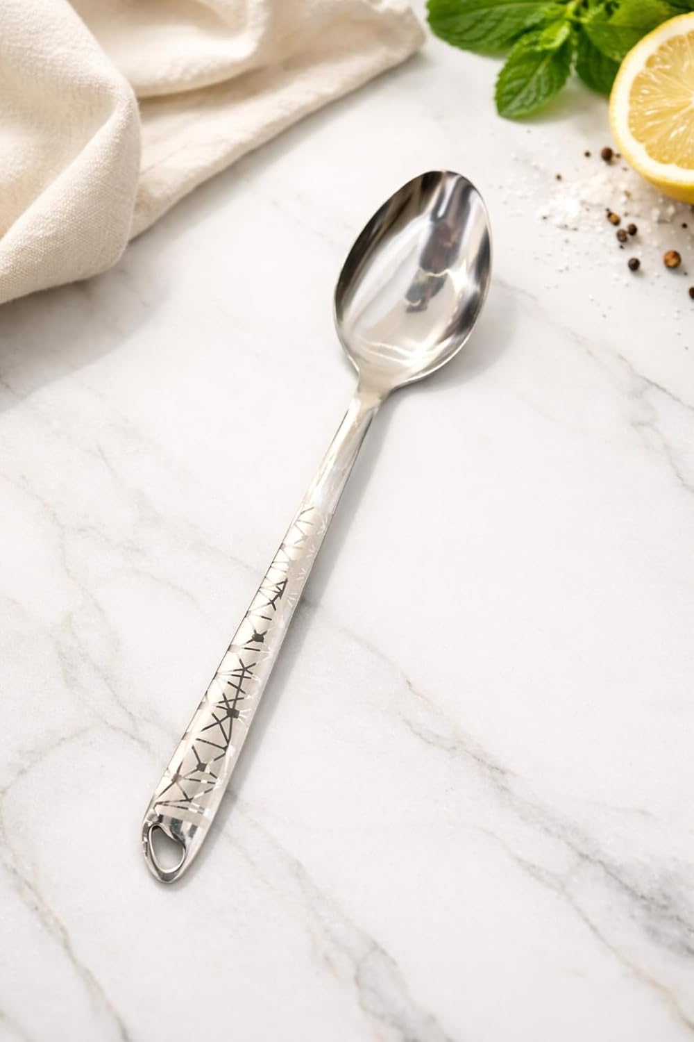 7AGAT stainless steel kitchen utensil with ergonomic handle, heat and rust-resistant, dishwasher safe in silver, gold, and rainbow finishes.