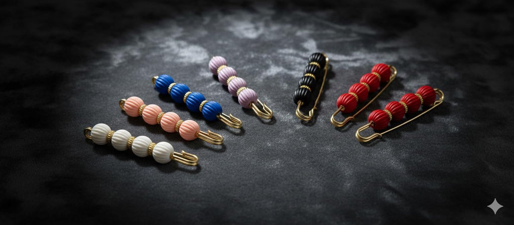 Decorative safety pin with beaded and crystal accents, stylish hijab pin from 7AGAT for versatile accessory use.