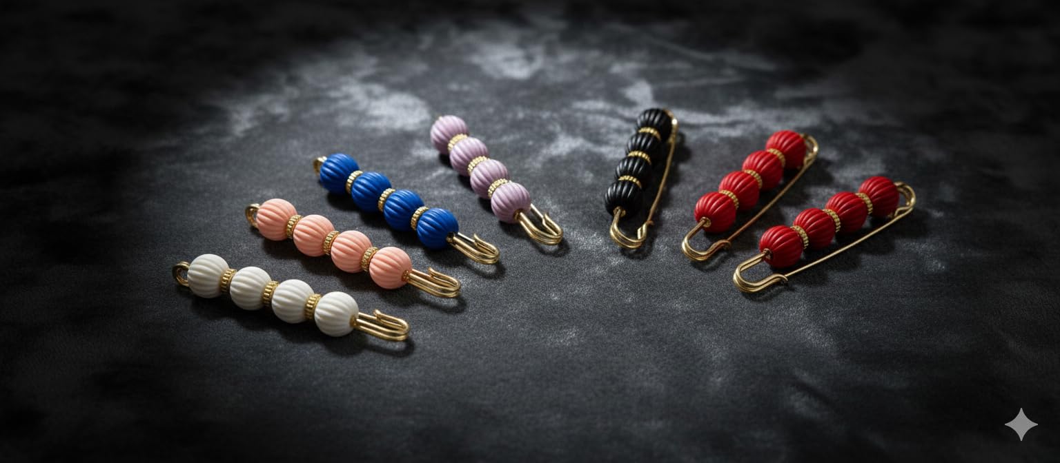 Decorative safety pin with beaded and crystal accents, stylish hijab pin from 7AGAT for versatile accessory use.