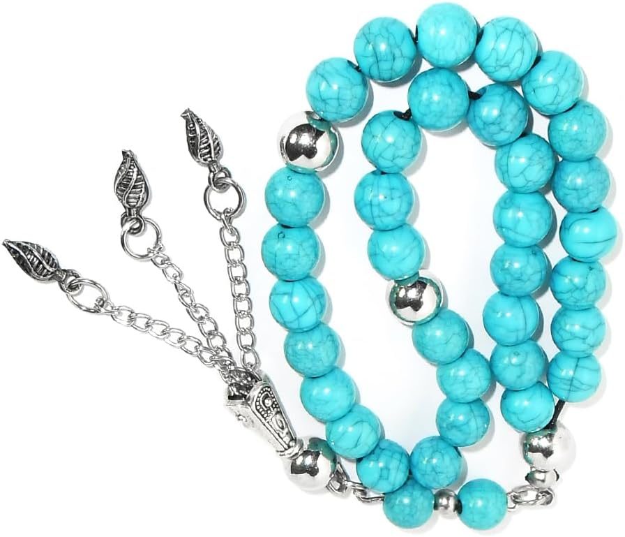 Handmade 7AGAT rosary with fayrouz clerk beads and metal separators, perfect for meditation and gifting, displayed in a gift bag.