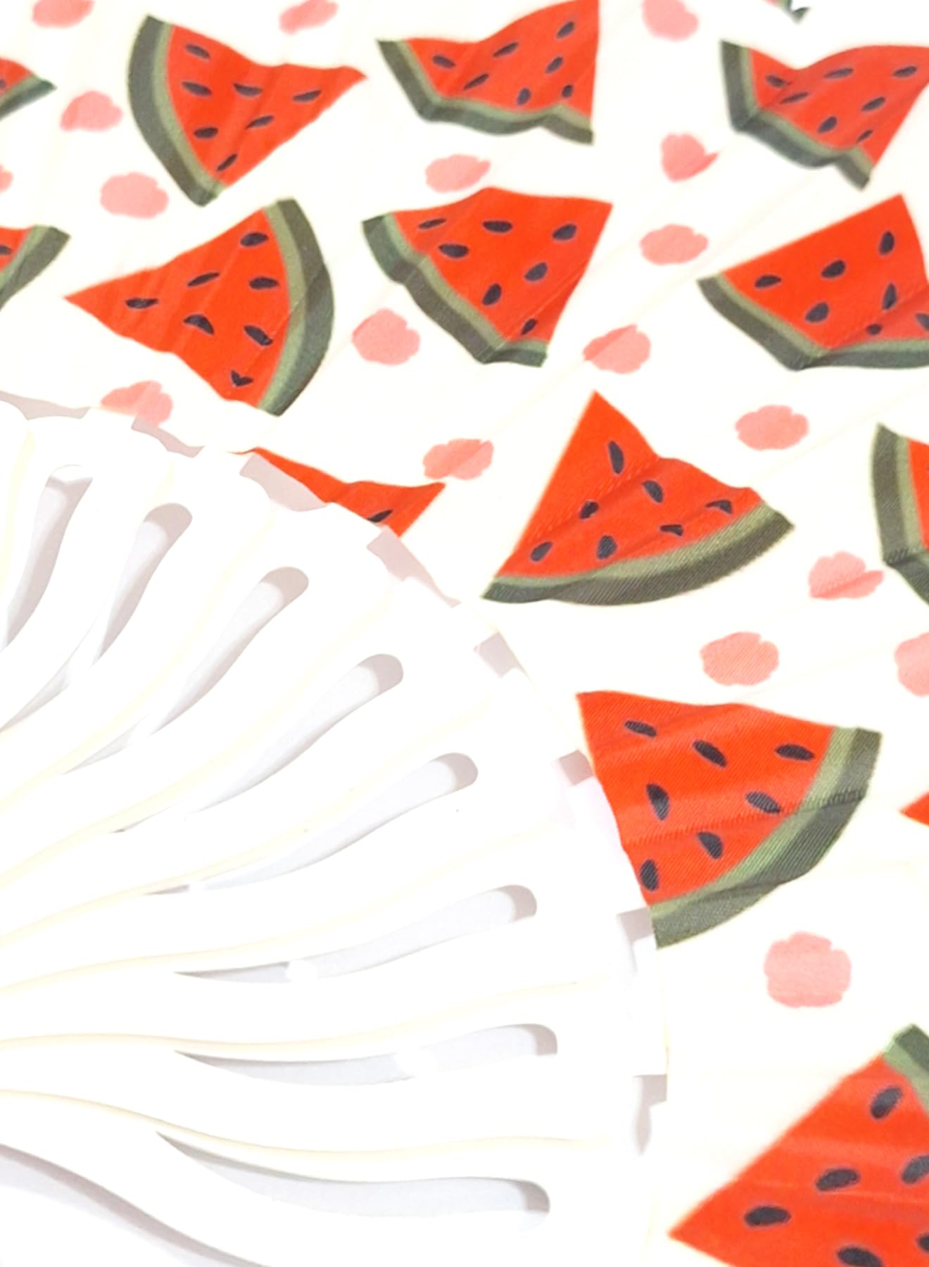 Colorful plastic folding hand fan with wavy handle by 7AGAT, featuring fun prints and compact design for summer use