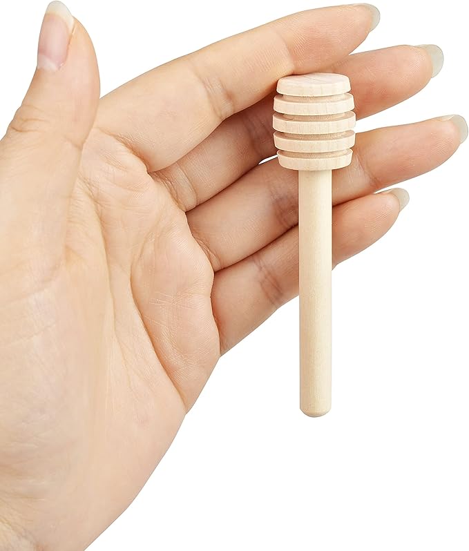 Set of three wooden honey dipper sticks with mini honey spoons for honey jars, ideal for dispensing and stirring honey.