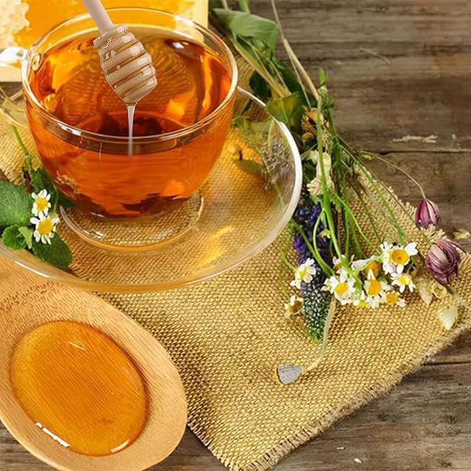 Set of three wooden honey dipper sticks with mini spoons for honey jars, ideal for dispensing, mixing, and stirring honey.
