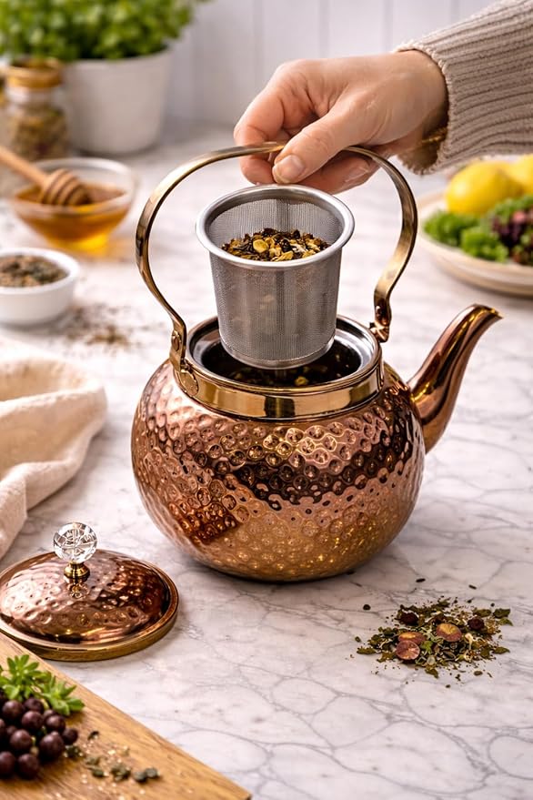 Hammered copper stainless steel tea kettle by 7AGAT with removable infuser, 1.6L capacity, stovetop safe for tea and coffee brewing.