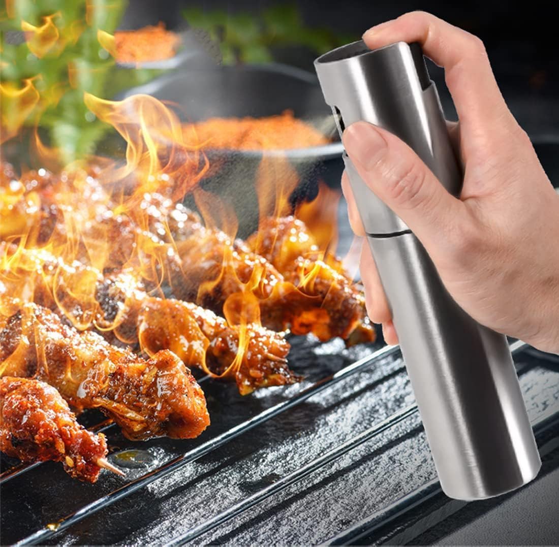 7AGAT stainless steel and plastic oil spray bottle with fine mist for cooking, grilling, baking, and air frying.