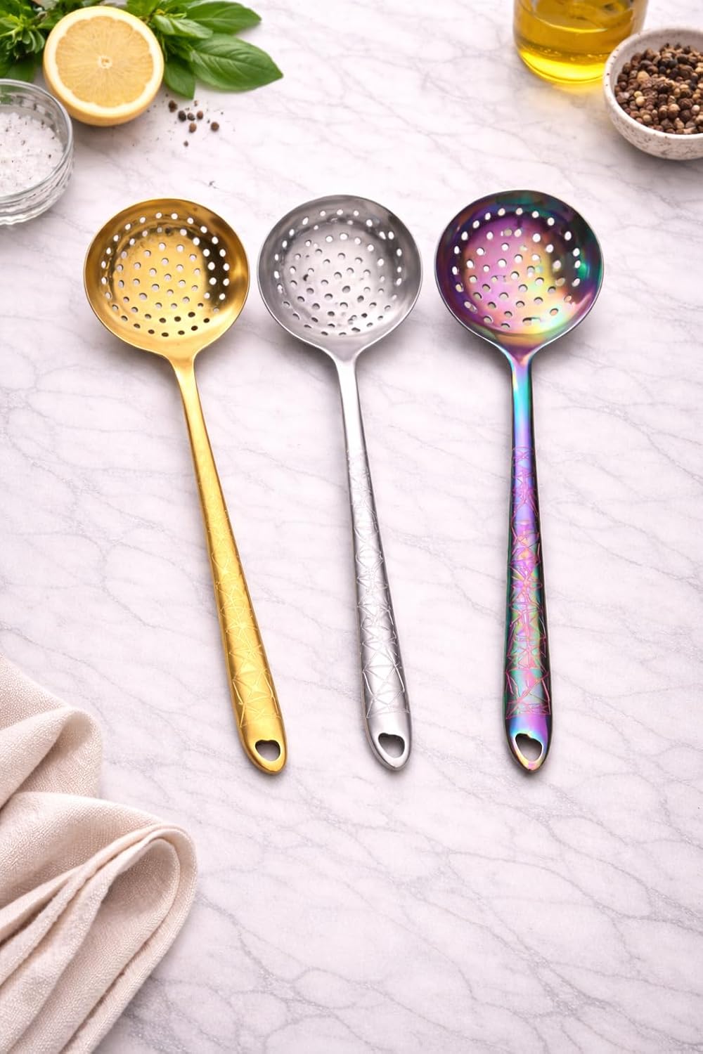 7AGAT stainless steel kitchen utensil with ergonomic handle, heat and rust resistant, dishwasher safe, in silver, gold, and rainbow finishes.