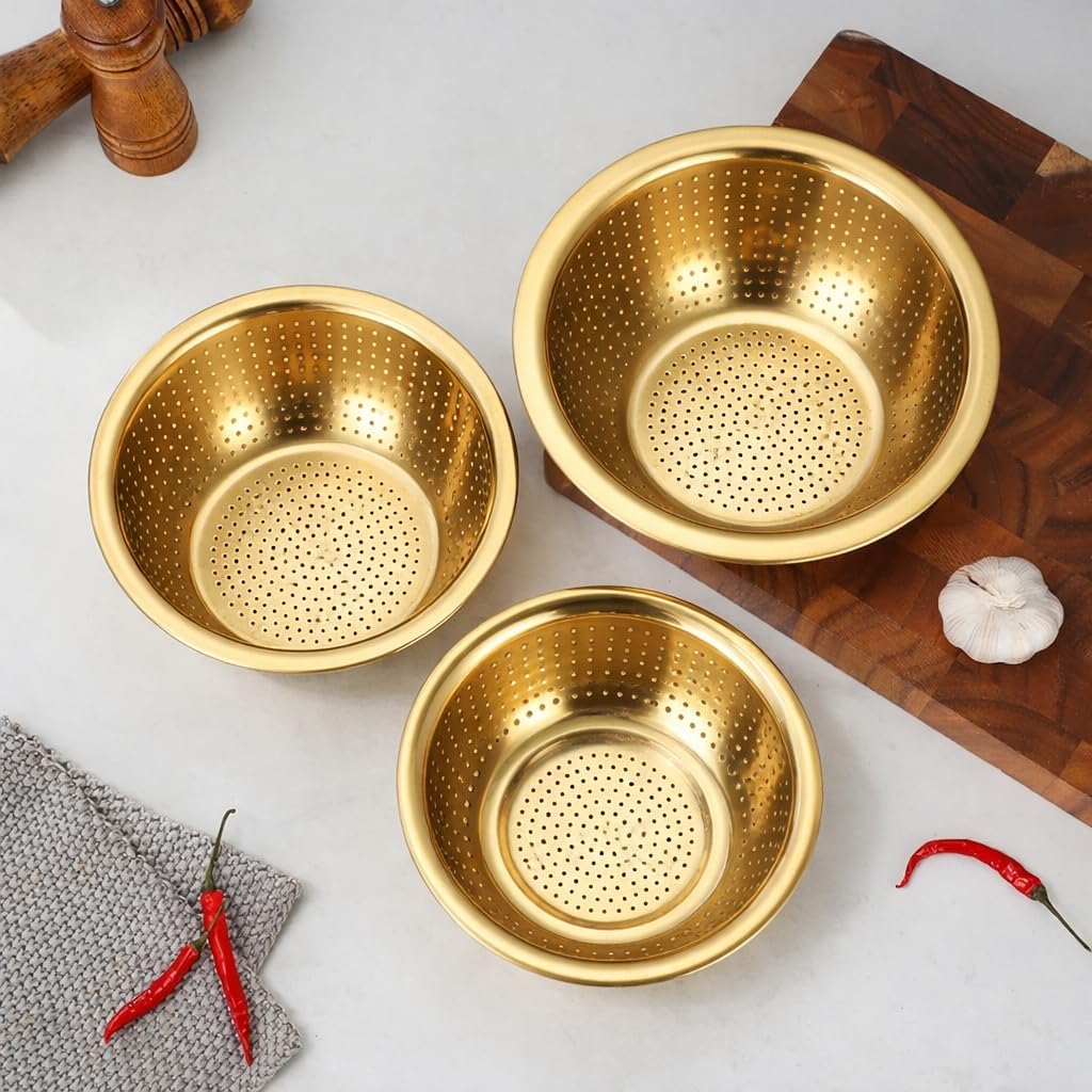 Set of three stainless steel bowls with gold finish from 7AGAT, perfect for food prep, washing, and serving in the kitchen.