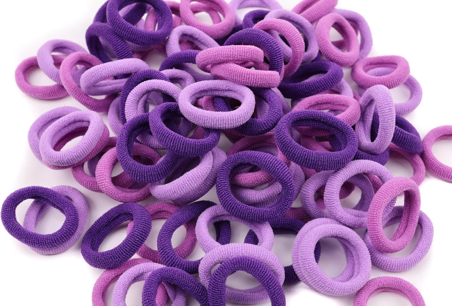 Set of 100 small baby hair ties by 7AGAT, elastic rubber ponytail holders for girls, gentle and secure hair elastic bands.