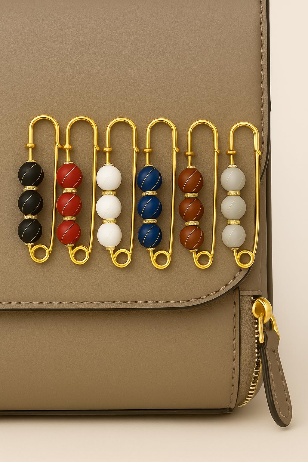 Decorative hijab pin by 7AGAT featuring a beaded design with crystal accents, multi-purpose styling safety pin accessory.