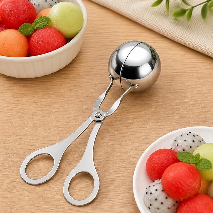 7AGAT stainless steel meatball scoop with ergonomic handle, ideal for ice cream, dough, and food portioning in silver.