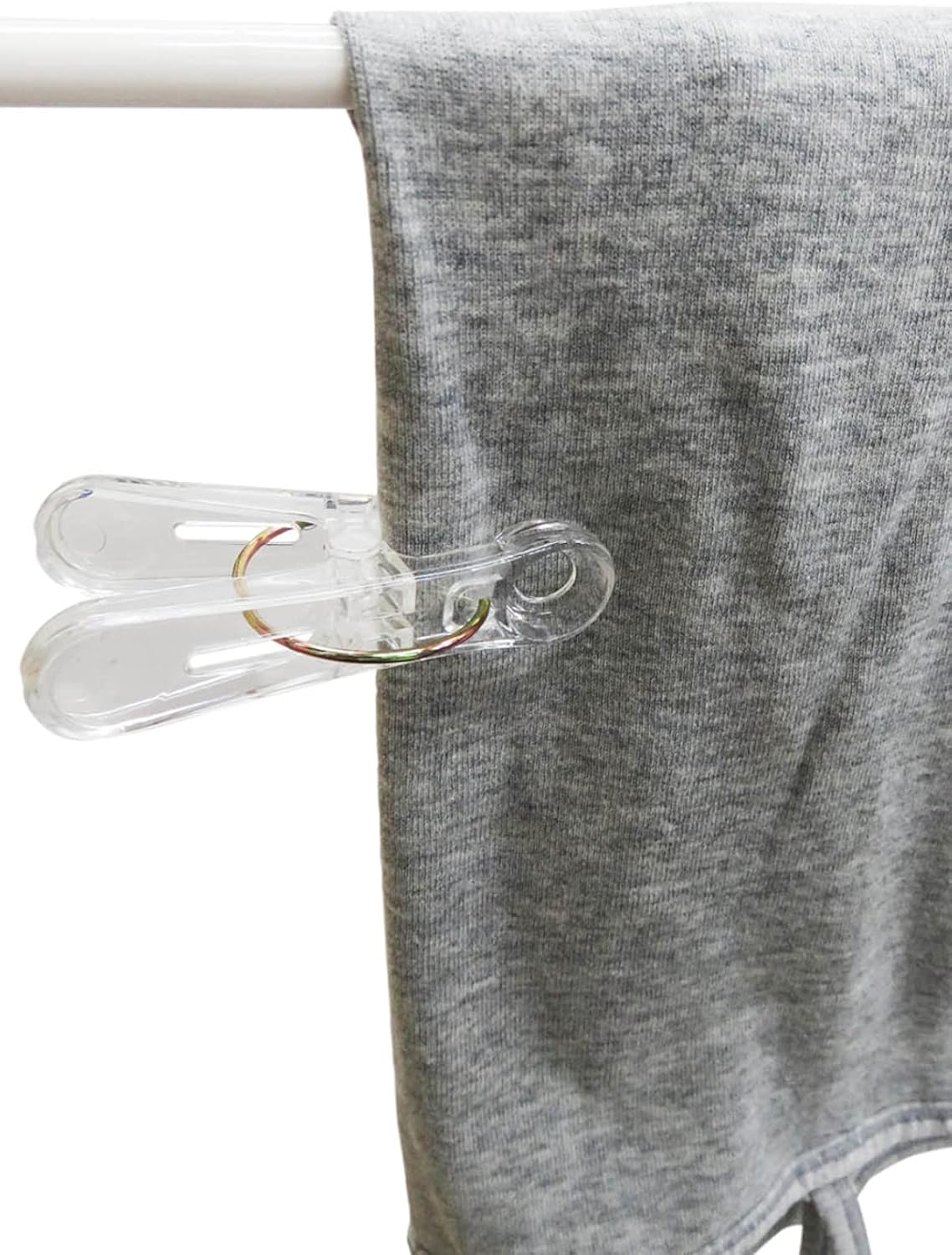 Set of 24 clear plastic clothespins with metal hanging rings, ideal for laundry, photos, and craft projects by 7AGAT.