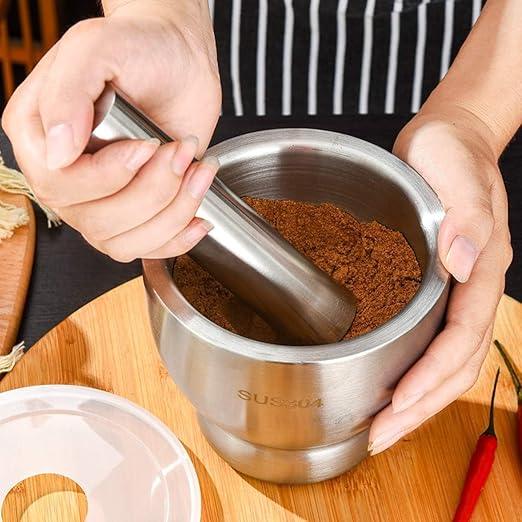 7AGAT stainless steel mortar and pestle set for grinding spices, garlic, and herbs with a durable lid and heavy-duty design.