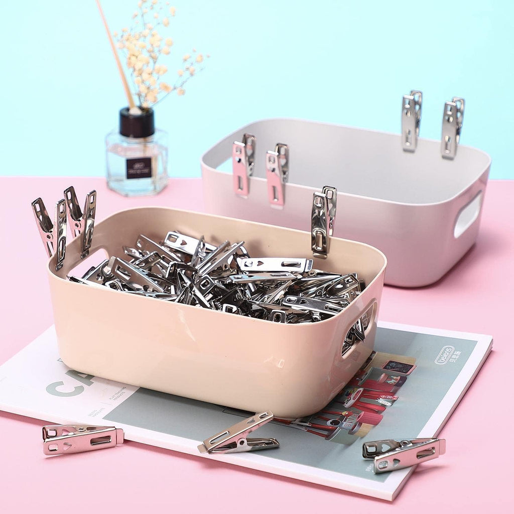 Heavy-duty stainless steel clothespins by 7AGAT, rustproof silver laundry clips for all fabric types, durable and versatile.