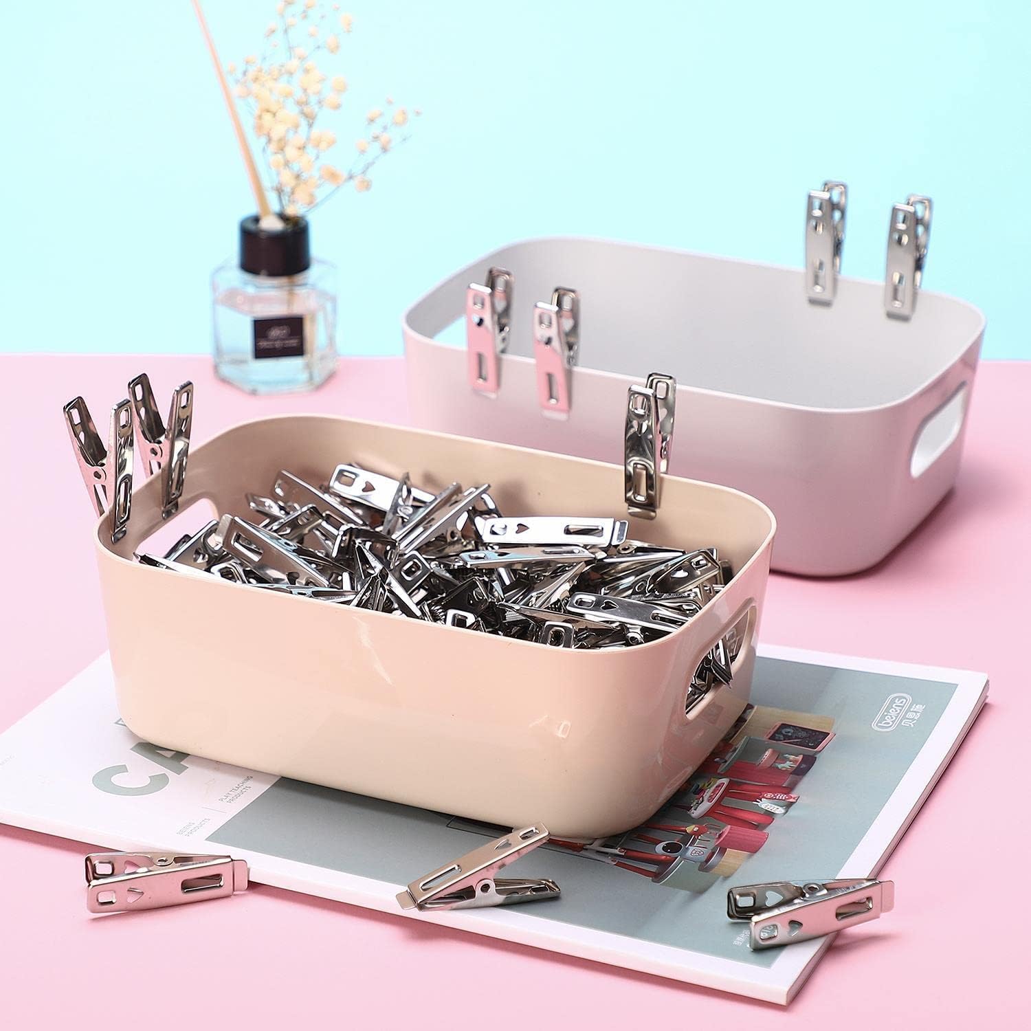 Heavy-duty stainless steel clothespins by 7AGAT, rustproof silver laundry clips for all fabric types, durable and versatile.