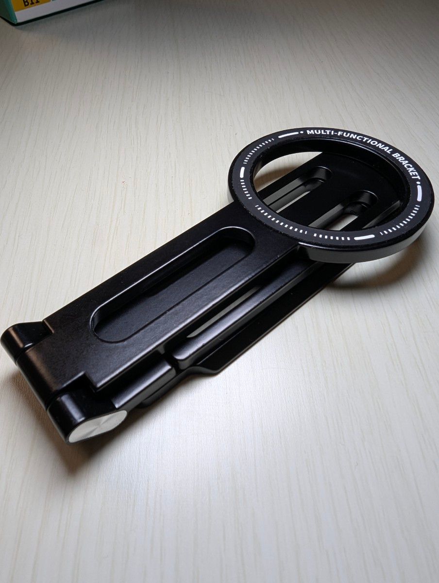 7AGAT MagSafe magnetic phone mount with foldable design and 1/4" tripod mount for smartphone photography and content creation.