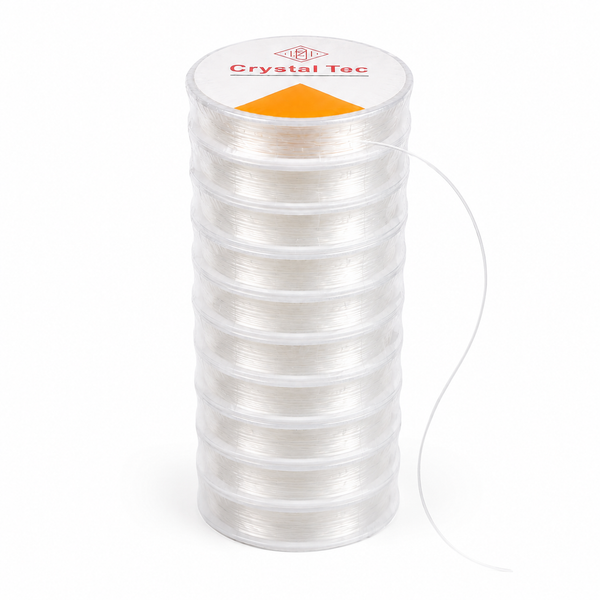A spool of clear crystal thread wound on a clear plastic core, with a white top label reading 'Crystal Tec' and an orange triangle, shown on a white background.