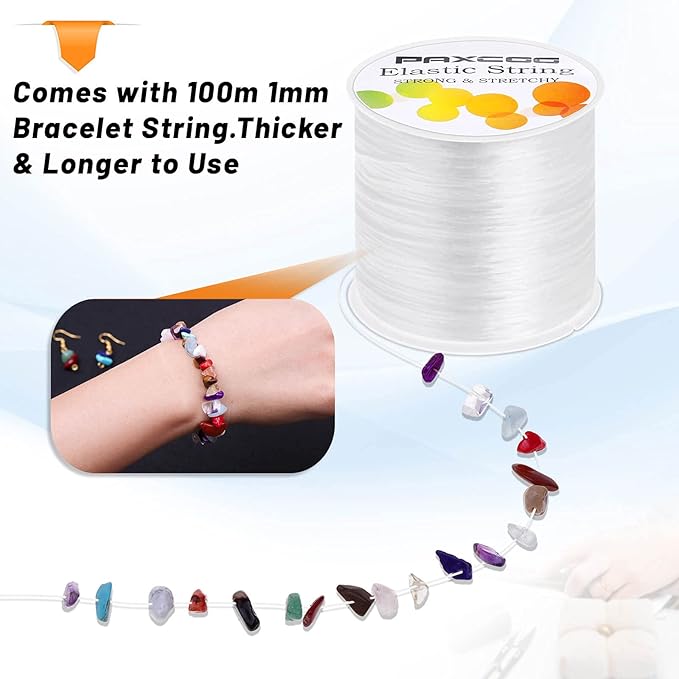 Spool of elastic string with bracelet on wrist and colorful beads on string