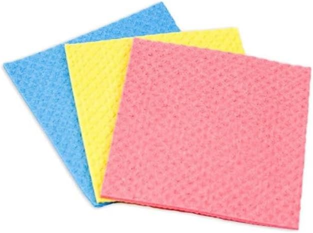 Three textured microfiber cleaning cloths in pink, yellow, and blue, arranged in a fan shape on a plain white background.