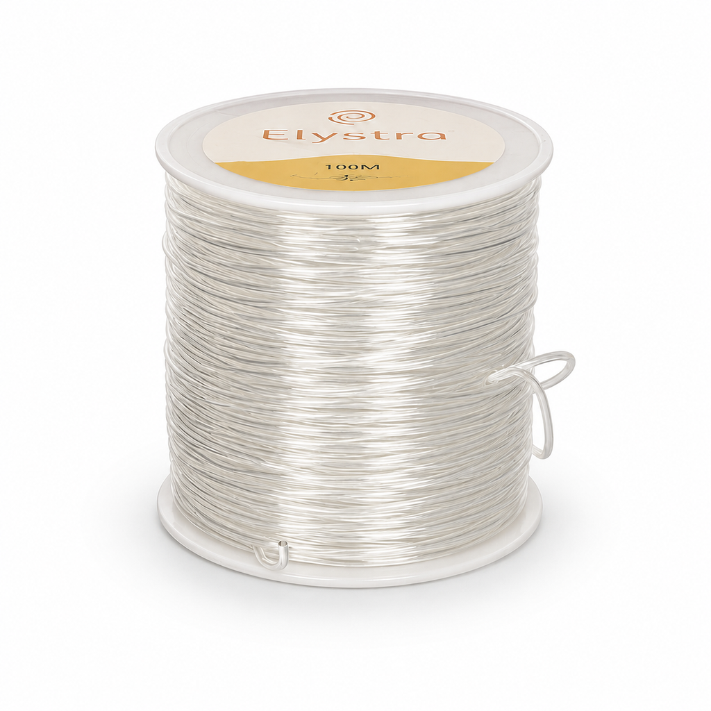 A spool of Elystra 100M clear silicone fishing line, shown on a clean white background.