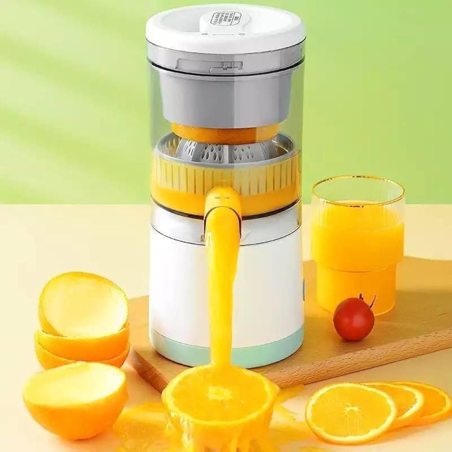 Orange juicer with a glass of orange juice on a wooden surface