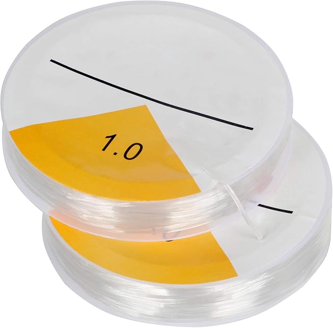 Two clear plastic petri dishes stacked on top of each other, each containing a yellow wedge-shaped insert marked with the number 1.0 and a black measurement line.