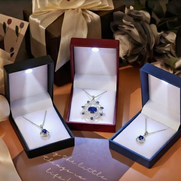 Luxury octagonal LED jewelry box by 7AGAT with compartments for necklaces, earrings, ideal for proposals and anniversaries.