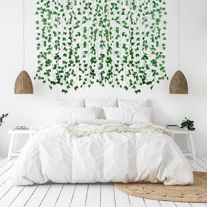 Artificial ivy vine garlands for room decor, 12-pack, lush green hanging greenery for walls, weddings, and outdoor garden decoration.