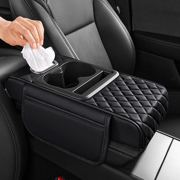 Car cup holder cover with quilted design and hand holding a tissue.
