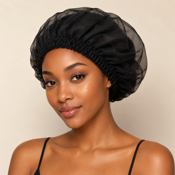 Black 7AGAT silk sleep bonnet with wide elastic band, adjustable hair wrap for curly, frizzy hair protection during sleep.