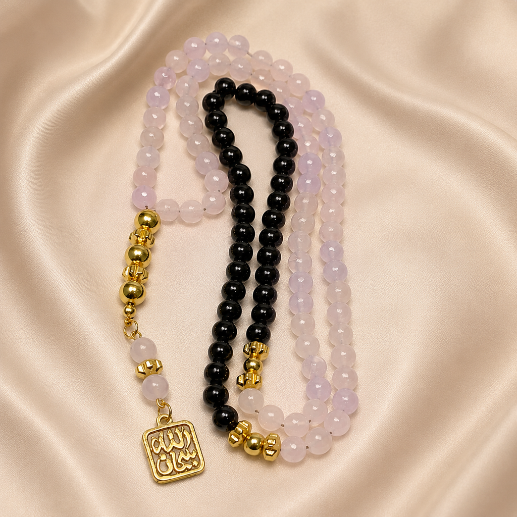 Handmade 7AGAT rosary with 99 natural rose quartz beads, gold tassel, separators, and intricate craftsmanship for prayer and meditation.