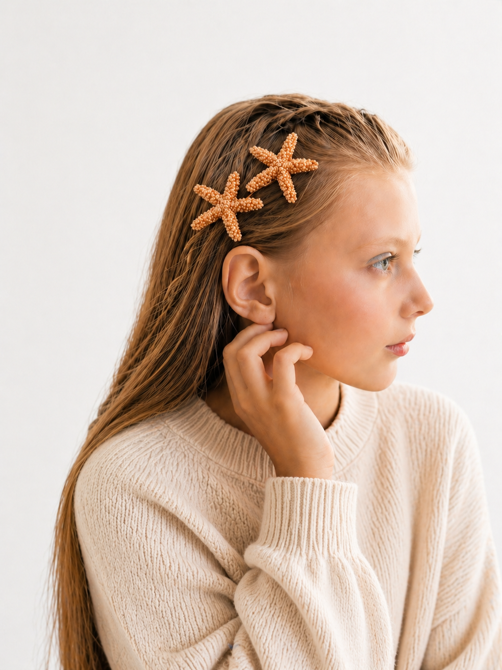 Starfish hair clips by 7AGAT, durable plastic resin claws with ocean-inspired design, secure grip for daily wear and special occasions.