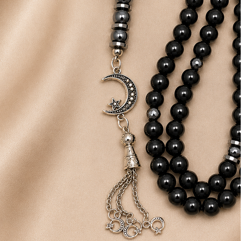 Handmade 8mm black hematite prayer beads rosary with silver separators, metal clasp, and gift pouch from 7AGAT.