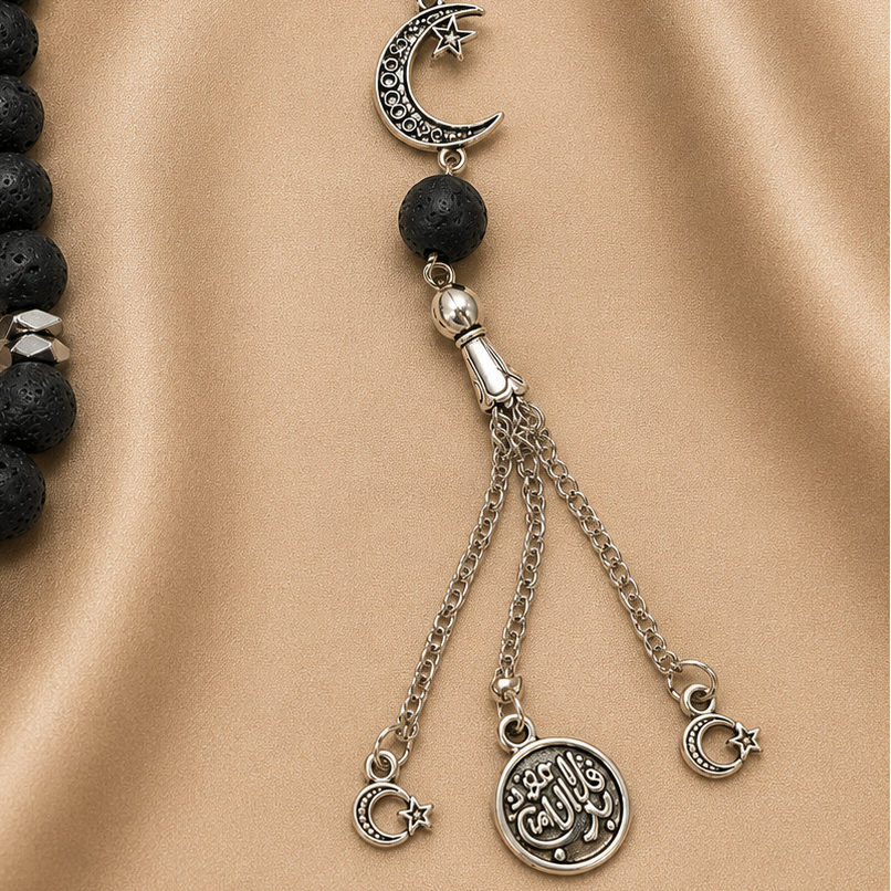 Handmade 33-bead Islamic tasbih with 10mm prayer beads and burlap bag, crafted by 7AGAT, featuring intricate bead details.