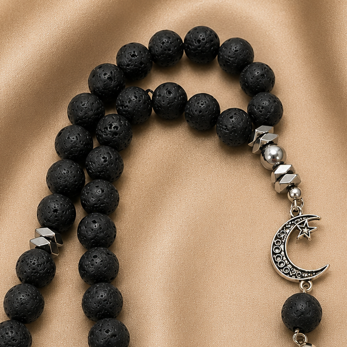Handmade 33-bead Islamic tasbih with 10mm prayer beads and burlap bag, crafted by 7AGAT, featuring natural stone beads.