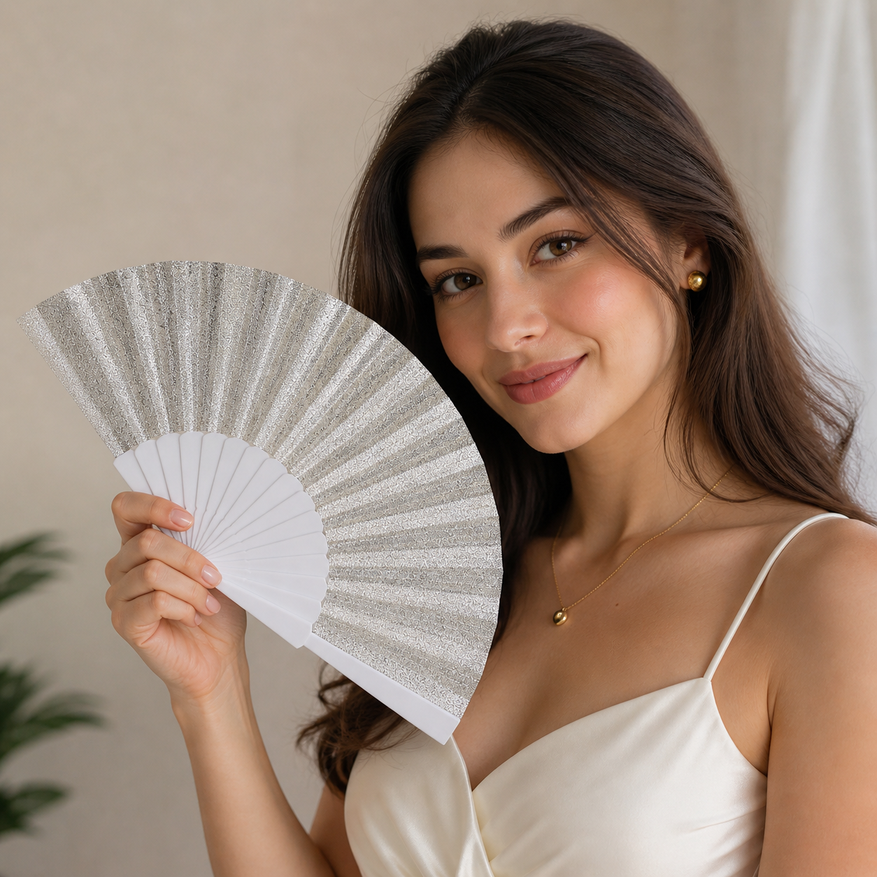 Elegant glitter folding hand fan with sparkle design, lightweight and portable, ideal for parties and weddings by 7AGAT.